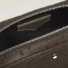 Mini bolsa a tiracolo em pele de avestruz estampada